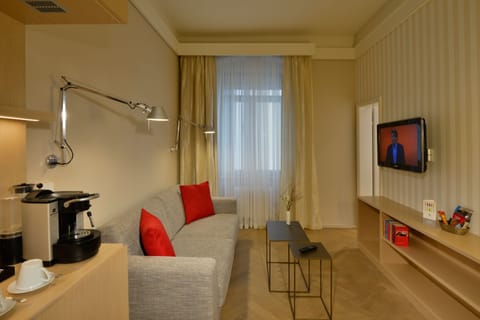 Junior Suite, 1 King Bed | Premium bedding, minibar, in-room safe, individually furnished