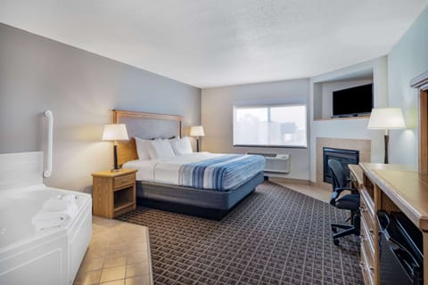 Superior Suite, 1 King Bed, Non Smoking | 1 bedroom, pillowtop beds, in-room safe, desk