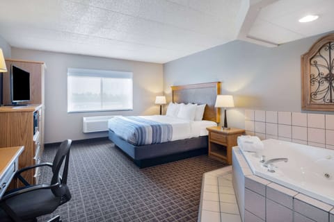 Suite, 1 King Bed, Non Smoking (Kitchenette) | 1 bedroom, pillowtop beds, in-room safe, desk