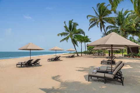 Private beach, white sand, sun loungers, beach umbrellas