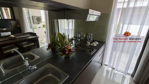 One Bedroom Suite | Private kitchen | Stovetop, coffee/tea maker, electric kettle, cookware/dishes/utensils