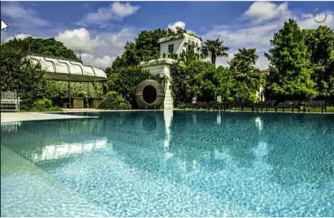 Seasonal outdoor pool, pool umbrellas, sun loungers
