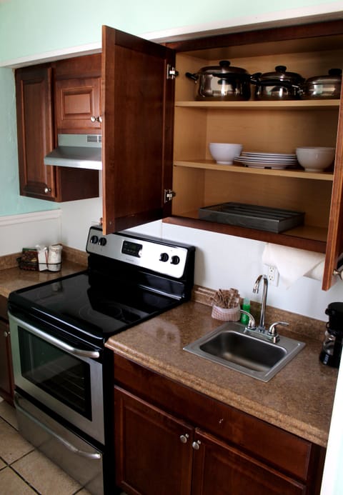 Suite with Two Doubles, Beachfront, Balcony | Private kitchen | Fridge, stovetop, coffee/tea maker, freezer