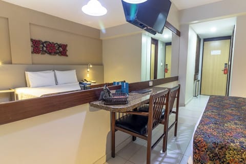 Deluxe Room | Minibar, in-room safe, desk, free WiFi