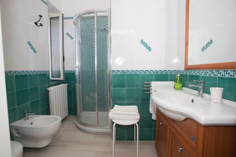 Double Room | Bathroom | Shower, hair dryer, bathrobes, bidet