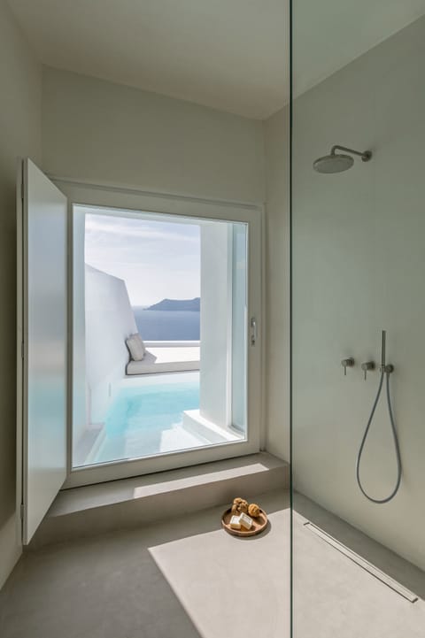 Mythic Suite with Private Outdoor Plunge Pool and 180o Caldera View | Bathroom | Free toiletries, hair dryer, bathrobes, slippers