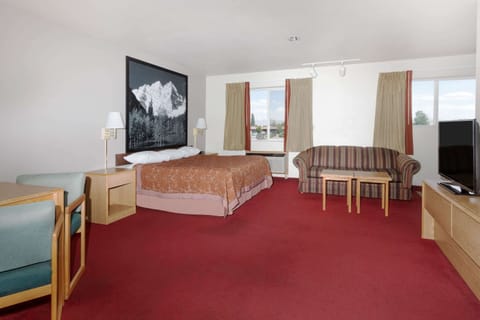 Suite, 1 King Bed | Iron/ironing board, free cribs/infant beds, rollaway beds, free WiFi