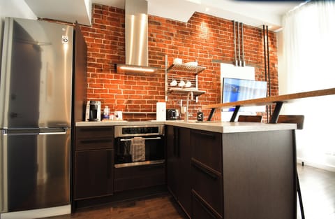 Studio Loft - Suite 204 | Private kitchen | Microwave, stovetop, coffee/tea maker, cookware/dishes/utensils