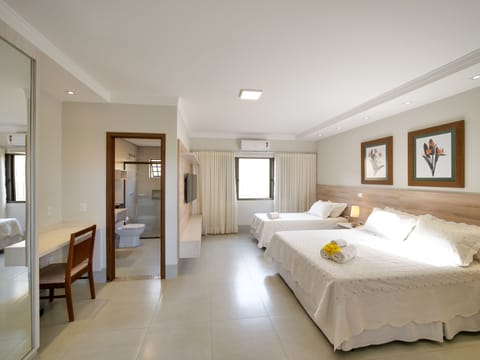 Deluxe Triple Room | 16 bedrooms, premium bedding, pillowtop beds, minibar