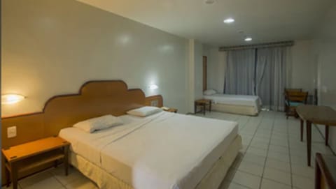 Superior Room, Multiple Beds | Minibar, desk, free WiFi