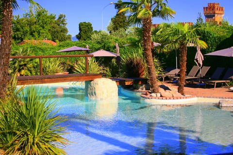 3 outdoor pools, pool umbrellas, sun loungers