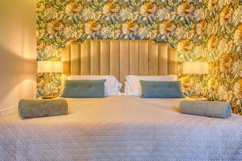 Family Suite, 2 Bedrooms, Lake View | Down comforters, memory foam beds, minibar, in-room safe