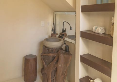 Suite, Ocean View | Bathroom | Shower, rainfall showerhead, free toiletries, hair dryer