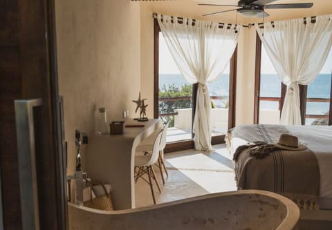 Deluxe Room, 1 King Bed, Bathtub, Beach View | Living area