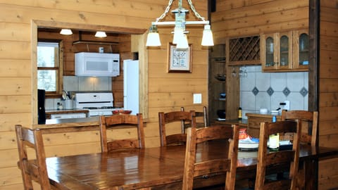 Dining area is located just off the kitchen, pantry and bar.