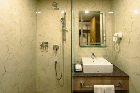 Deluxe Quadruple Room, 2 Queen Beds, Non Smoking | Bathroom | Shower, rainfall showerhead, hair dryer, bathrobes