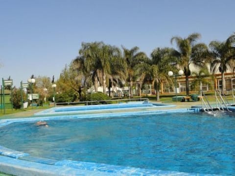 Seasonal outdoor pool, open 2:00 PM to 10:00 PM, sun loungers