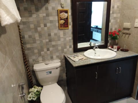 Premium Room, Multiple Beds | Bathroom | Shower, rainfall showerhead, free toiletries, hair dryer