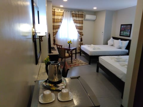 Family Suite | Premium bedding, minibar, in-room safe, individually furnished