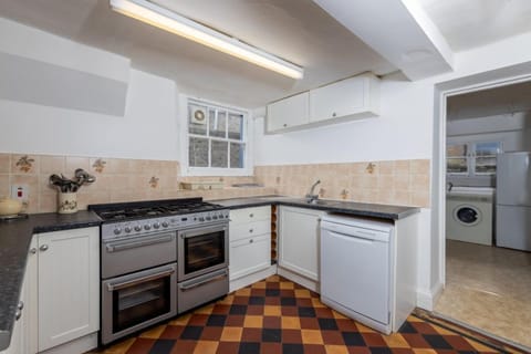 House, 4 Bedrooms (Newtown House) | Private kitchen | Full-size fridge, microwave, toaster, cleaning supplies