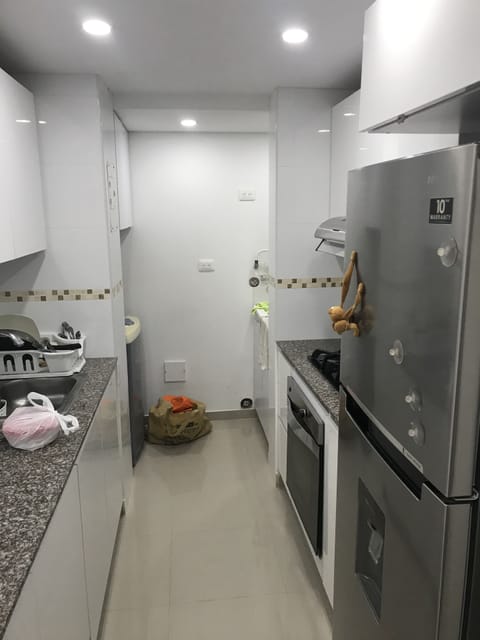 Exclusive Apartment | Private kitchen | Full-size fridge, oven, blender, cleaning supplies