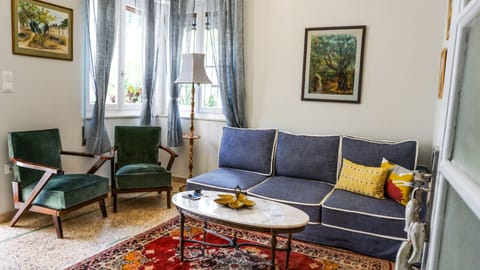 Apartment, 2 Bedrooms | Living area | LCD TV, offices