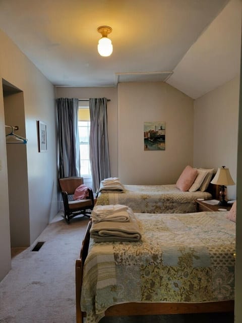 Basic Room, 2 Twin Beds, Non Smoking (Room 9, Third Floor) Shared Shower | Individually decorated, individually furnished, iron/ironing board