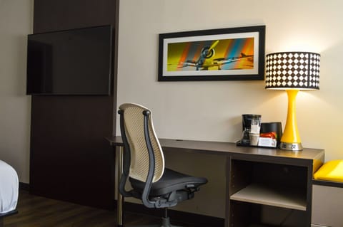 Desk, laptop workspace, blackout drapes, iron/ironing board