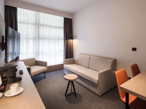 Suite, Multiple Beds, Non Smoking, Kitchenette (with Sofabed) | Minibar, in-room safe, desk, laptop workspace