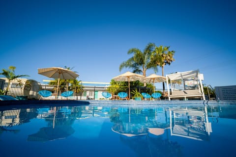 Outdoor pool, open 8:30 AM to 8:00 PM, sun loungers