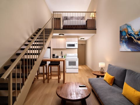 Superior Studio Suite | In-room safe, desk, laptop workspace, blackout drapes