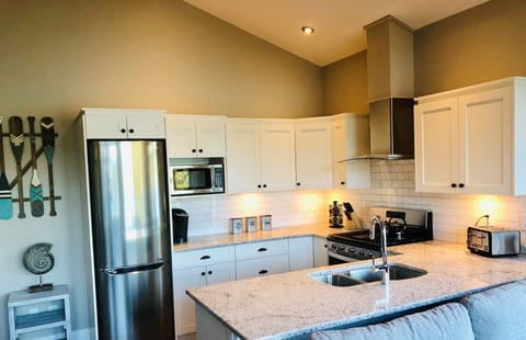 Modern kitchen with quartz counter tops and large sink