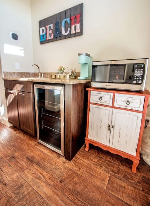 The third floor playroom is also stocked with a mini-bar that includes a microwave, mini-fridge, and Keurig - perfect for getting those snacks and refreshments ready!
