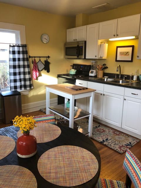 Cart can be rolled near sink and stove for extra prep space.