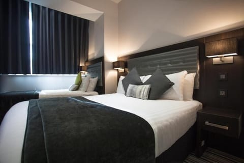 Deluxe Double Room | Egyptian cotton sheets, down comforters, pillowtop beds, in-room safe