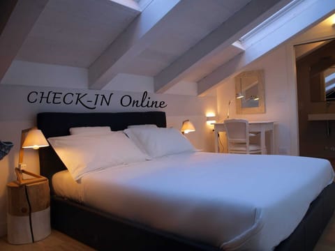 Family Triple Room | Individually decorated, individually furnished, desk, blackout drapes