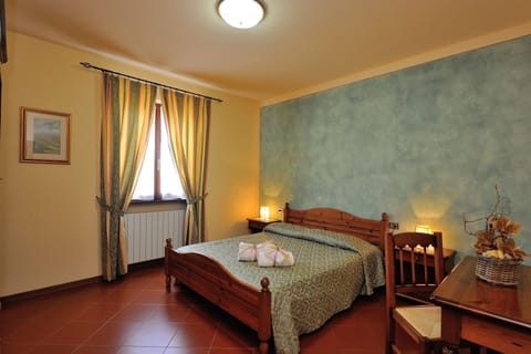 Apartment, 2 Bedrooms | Desk, blackout drapes, iron/ironing board, free cribs/infant beds