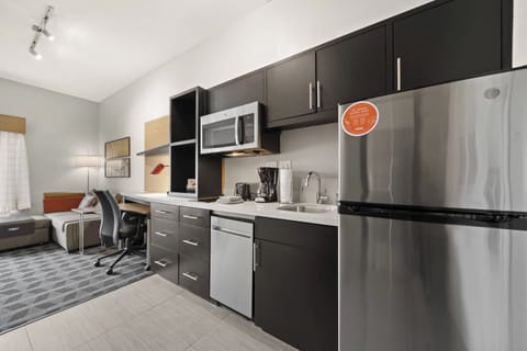 Studio, 1 King Bed with Sofa bed | Private kitchen | Full-size fridge, microwave, stovetop, dishwasher