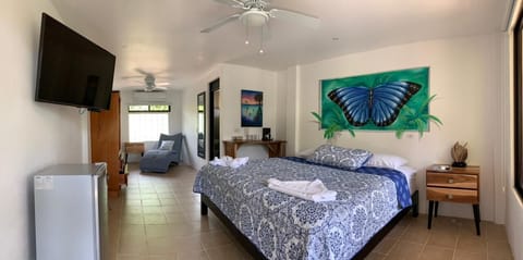 Deluxe Room, 1 King Bed | In-room safe, individually decorated, individually furnished