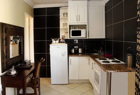 Self Catering | Private kitchen | Fridge, microwave, coffee/tea maker, electric kettle