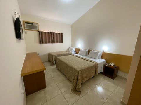 Economy Triple Room, Multiple Beds | Minibar, free WiFi, bed sheets