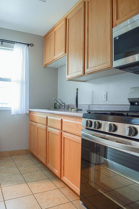 Deluxe Room, 2 Queen Beds, Kitchen | Private kitchen | Fridge, microwave