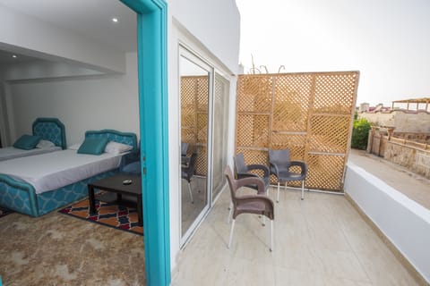 Superior Triple Room with sea view | Terrace/patio