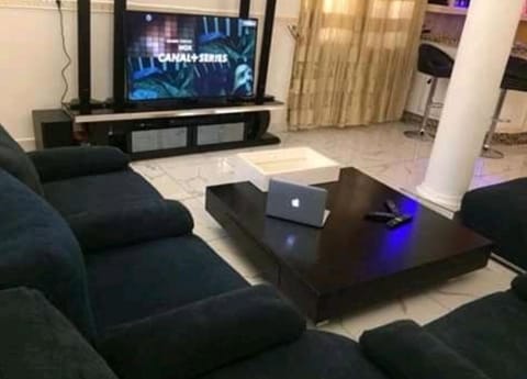 Apartment, 3 Bedrooms | Living room | 32-inch flat-screen TV with cable channels, TV