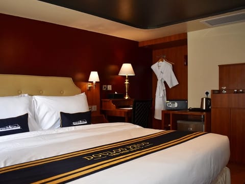 Deluxe Plus Double or Twin Room | Minibar, in-room safe, individually decorated, individually furnished