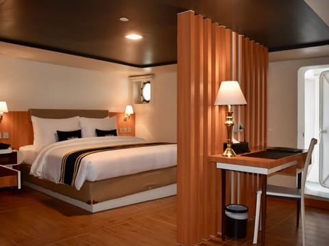 Family Balcony Suite Cabin | Minibar, in-room safe, individually decorated, individually furnished