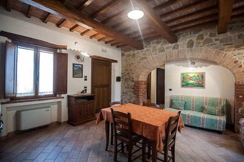 Traditional Apartment | Living area | Flat-screen TV, fireplace, table tennis