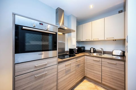 Studio Apartment | Private kitchen | Full-size fridge, microwave, oven, stovetop