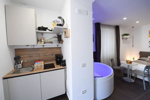 Double Room, Jetted Tub (Irene) | Private kitchenette | Full-size fridge, stovetop, espresso maker, coffee/tea maker