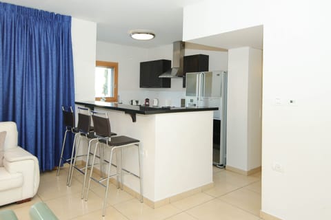 Apartment | Private kitchen | Full-size fridge, microwave, oven, stovetop